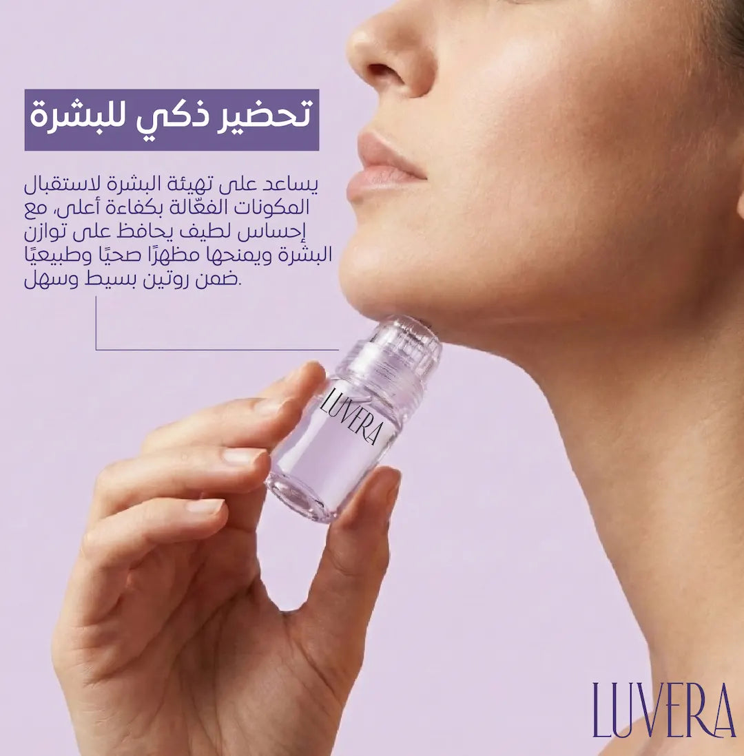 Hand holding a Luvera skincare bottle with a blurred face on a light purple background